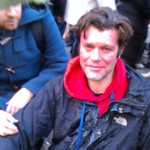 A protester hit with incapacitant spray