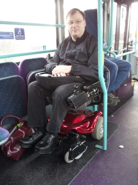 Me on a bus in a wheelchair!